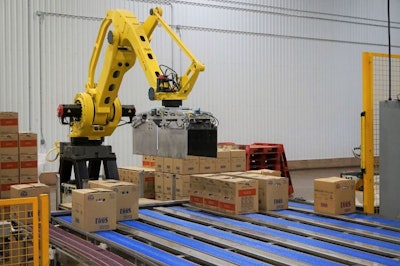 Robot arms, like this one loading pallets in an egg grading and processing facility, represent the industry’s movement to increase efficiency, reduce the need for labor, and process more eggs. | Austin Alonzo