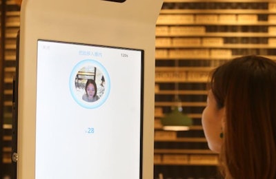 A customer using Alipay’s new “Smile to Pay” facial recognition payment solution in KPRO, Hangzhou. | Photo courtesy of Yum China Holdings