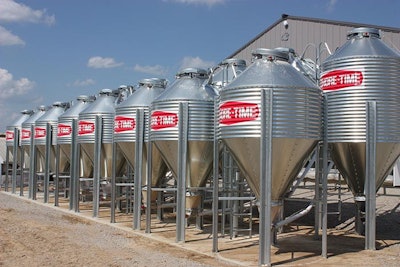 16 feed bins outside of the new swine research barn Kent Feed's just finished building. Photo courtesy of Kent Feeds.