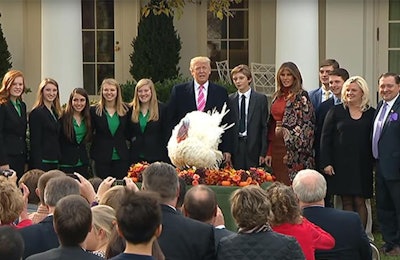 The Carl Wittenburg family joins the Trump family and Minnesota 4-H members for the presentation of the National Thanksgiving Turkey on November 22. | National Turkey Federation
