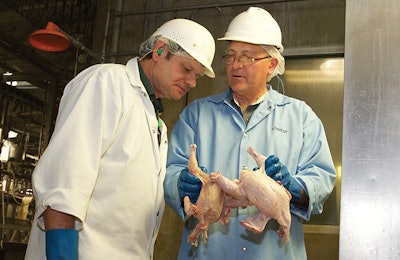 Zoetis' Dr. Douglas Fulnechek (left) said processing must work with live production to stay on top of Salmonella. (Courtesy of Zoetis)
