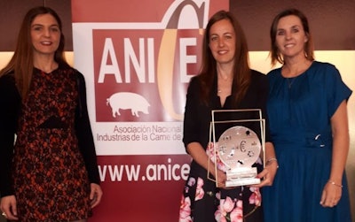 Marta Torres, OSI Spain’s human resources, health and safety, and environmental manager (center), receives the 2019 Sustainability and Environmental Prize. Also pictured are Maria Blanco, quality assurance manager (left), and Cristina Malagón, finance manager (right).(OSI Group)