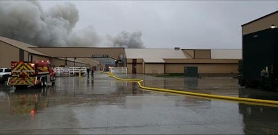 Firefighters respond to a Herbruck's Poultry Ranch barn fire on April 30. (Courtesy of Portland Area Fire Department)