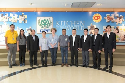 Leaders from Charoen Pokphand Foods celebrate the success of the company's compartmentalization program to help fight avian influenza. (CP Foods)
