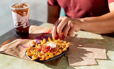 Nacho Fries have returned to Taco Bell featuring a buffalo chicken flavor (Taco Bell).