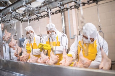 Worker absenteeism is part of poultry processing. Larger concerns lie with potential shutdowns due to a COVID-19 case at a plant. | (andresr | iStockPhoto.com)