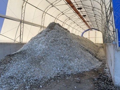 While dry storage may not be as convenient as wet manure storage, storing manure dry results in lower greenhouse gas emissions. (Dr. Vincent Guyonnet)