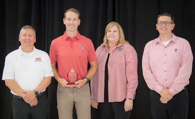 JT Pope, second from left, was honored as one of North Carolina State University's College of Agriculture and Life Sciences Outstanding Young Alumni at the recent CALS Alumni Awards ceremony. (Courtesy NC State)