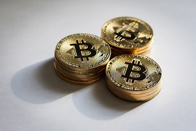 Huge stack of cryptocurrencies. Bitcoin business. Crypto currency gold Bitcoin. Bitcoin business modern currency exchange.