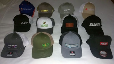 These are just some of the baseball caps that could be found at exhibitor booths at the 2022 Midwest Poultry Federation Convention. (Roy Graber)