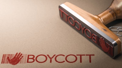 Word boycott printed on kraft paper with rubbber stamp and copy space. Activism concept. 3D illustration.