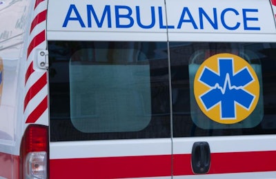 The back door of the ambulance. The word ambulance.