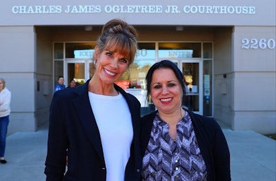 Alexandra Paul, left, and Alicia Santurio stand outside the courthouse where they will be tried for allegedly stealing Foster Farms chickens. (Direct Action Everywhere | Twitter)