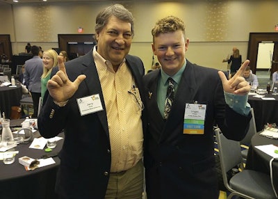 Oklahoma State University Professor Jerry Fitch and Logan Graber do their impressions of university mascot Pistol Pete between sessions at the 2023 Animal Agriculture Alliance Stakeholder's Summit. (Roy Graber)