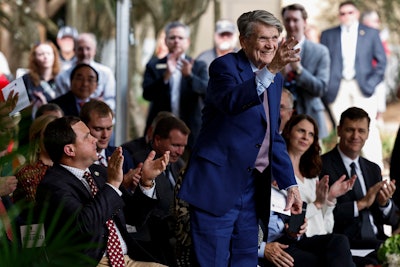 Donor and longtime supporter Abit Massey acknowledges President Morehead as he announces that a classroom inside the center will be named after him at the Poultry Science Building Dedication.