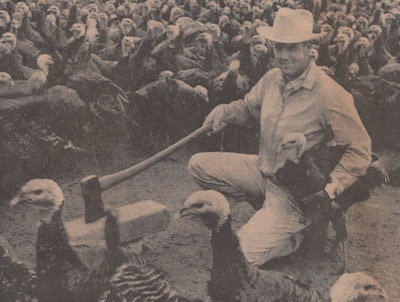 This photograph of Don Fourier and a flock of turkeys appeared on the front page of the November 29, 1963, edition of the Hutchinson News.