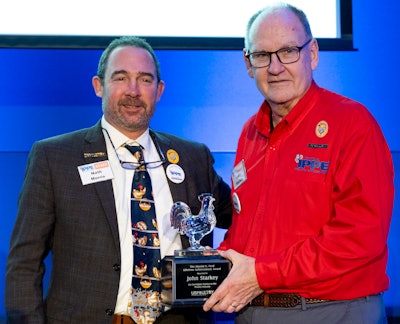 John Starkey, right, former president of the USPOULTRY, was honored with the Harold E. Ford Lifetime Achievement Award at the 2024 IPPE. He was presented with the award by Nath Morris, left, president of USPOULTRY.
