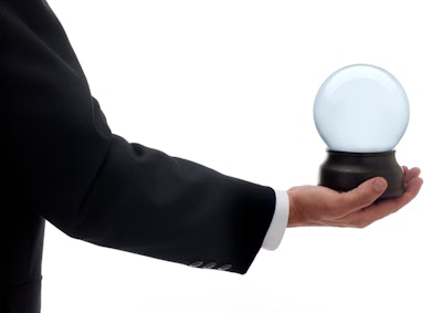 Business Man Holding Crystal Ball