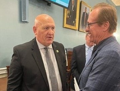 House Agriculture Committee Chairman Glenn Thompson, left, visits with Cooper Farms Chief Operating Officer Gary Cooper.