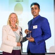 CIWF Patron, businessperson and TV personality Deborah Meaden (left) presents Manjunath Marappan, Founder Director CEO of Happy Hens, with the Good Egg Award.